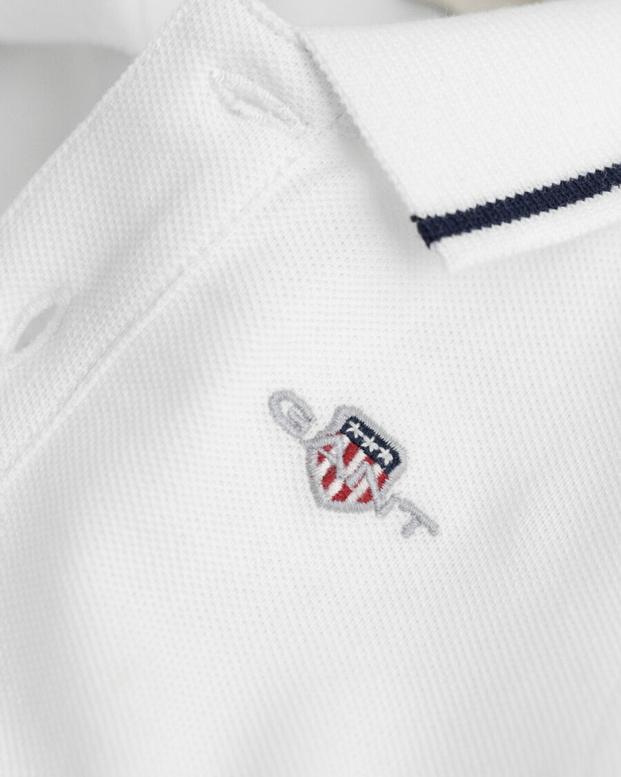 body a maniche lunghe in piqué baby shield - bianco