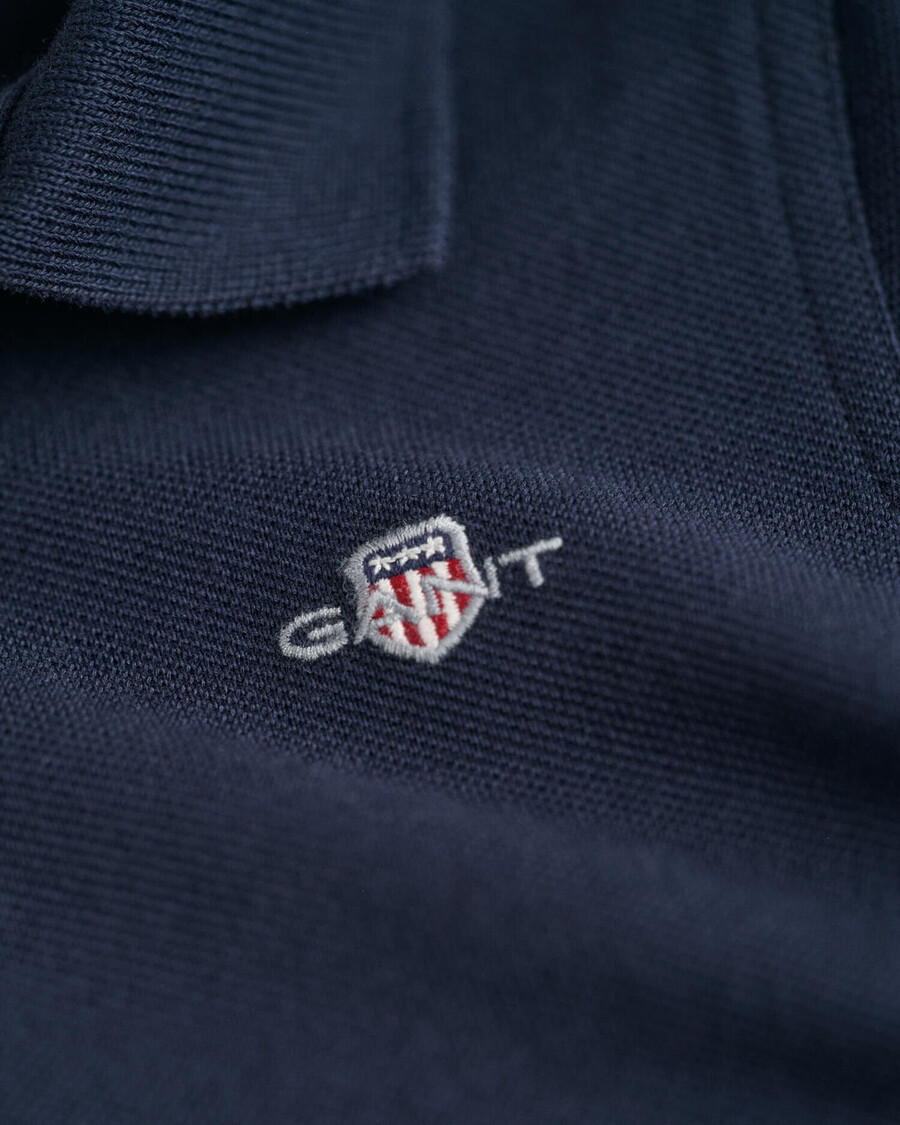 polo in piqué shield per bambini - blu sera