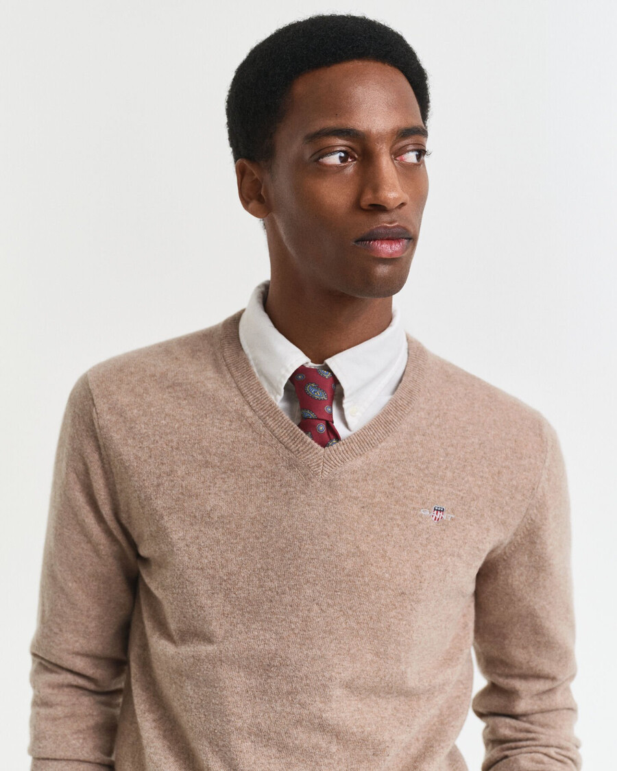 maglione con scollo a v in lana dagnello superfine - melange sabbia scura
